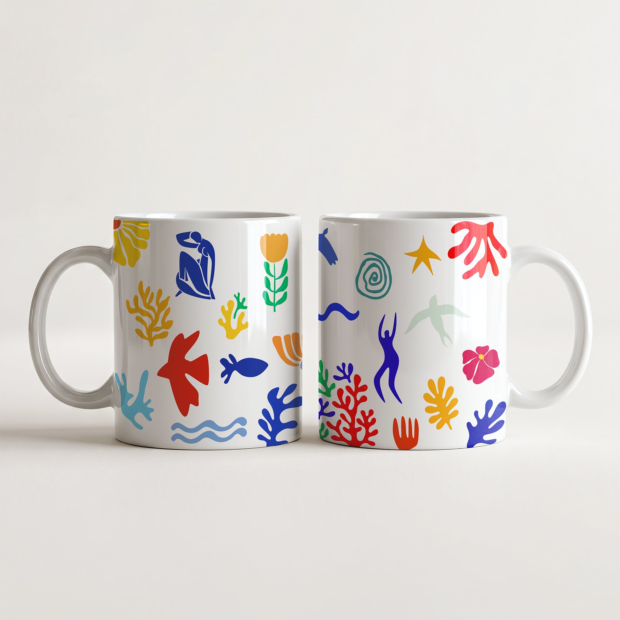 Wyjątkowy kubek z ikonicznymi wycinankami Henri Matisse'a (Cut-Outs). Trwała ceramika 330 ml i 450 ml z fowistycznym nadrukiem. Zamów na CheddarArt!